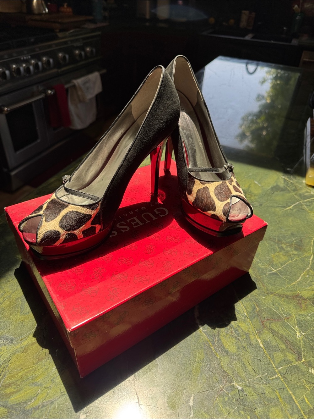 Guess by Marciano black suede peep-toe platform heels & brown & cream cow print